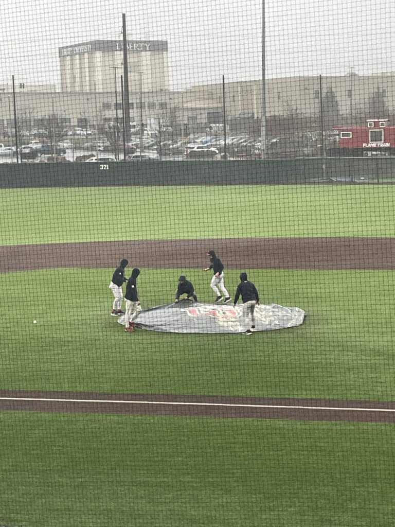 Rain delay during Liberty Flames baseball scrimmage